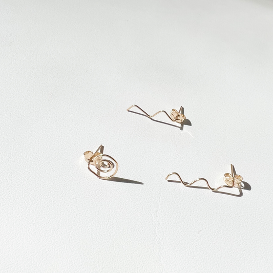 Roop Jewelry mix and match studs. Gold filled wire studs. Spiral studs. Squiggle studs. Zigzag studs. Spring 2022 fashion trends. Summer 2022 fashion trends. 
