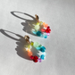 Roop Jewelry rainbow glass earrings. Kindergarten core aesthetic. Summer 2022 aesthetic. Spring 2022 aesthetic. Rainbow aesthetic. Summer 2022 jewelry trends.