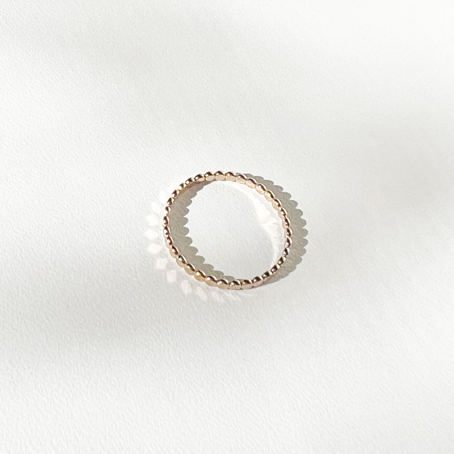 Roop jewelry gold filled ring. Flat gold dotted ring. High quality ring. Tarnish-free gold ring. Spring 2022 fashion trends. Spring 2022 jewelry trends.
