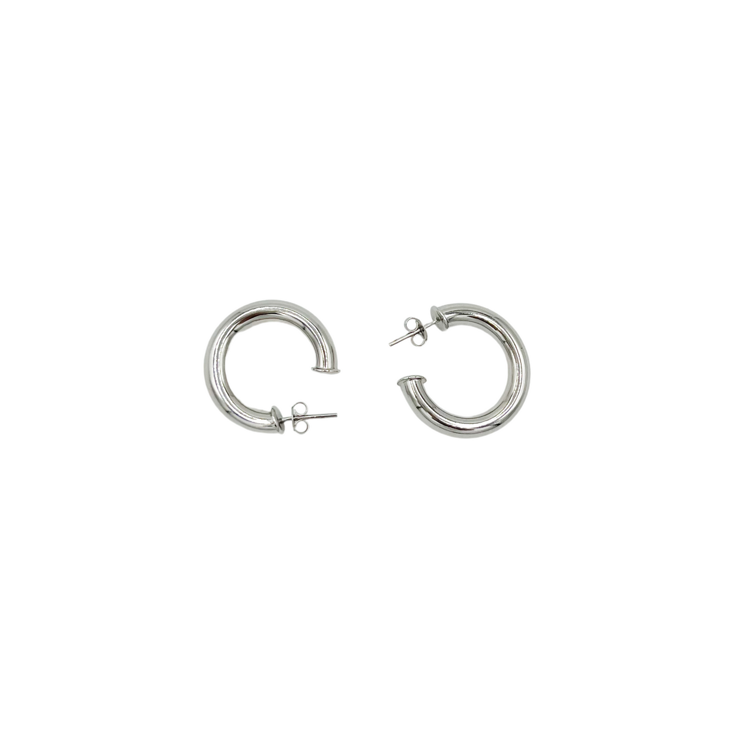 Roop Jewelry chunky hoops. Rhodium-filled chunky hoops. Silver hoops. bipoc jewelry boutique Oakland. South Asian jewelry business.