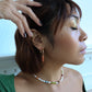 Roop Jewelry Biwa Pearl Earrings in Copper. Green pearl earrings. Shiny pearl earrings made in Oakland, Ca. 
