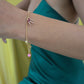 Roop Jewelry Confetti Bracelet. Bracelet with ruby, emerald, moonstone, and jade. Jewelry handmade in Oakland, Ca. 