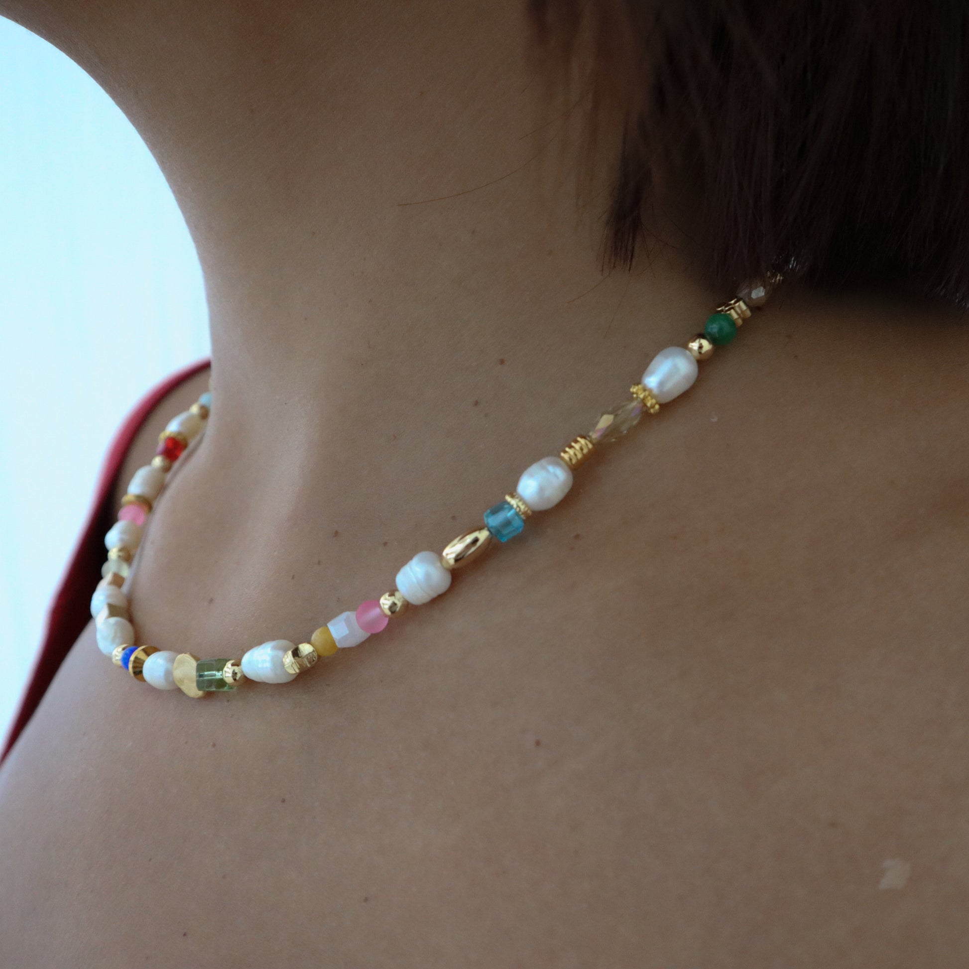Roop Jewelry Fête Necklace. Holiday party necklace made in Oakland, Ca. Colorful beaded gemstone and pearl necklace. 