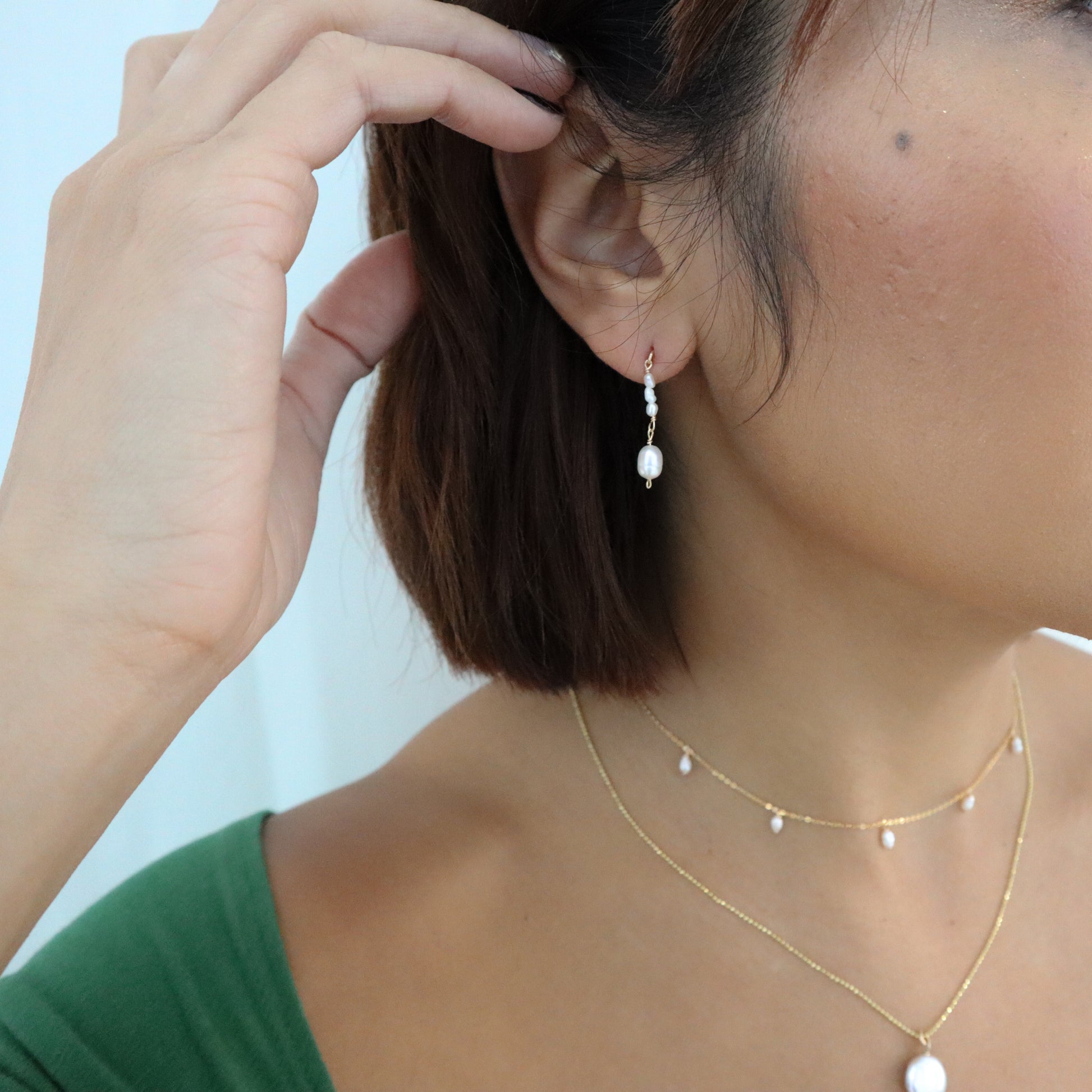 Roop Jewelry twinkle earrings in pearl drip. Handmade jewelry in Oakland, Ca.