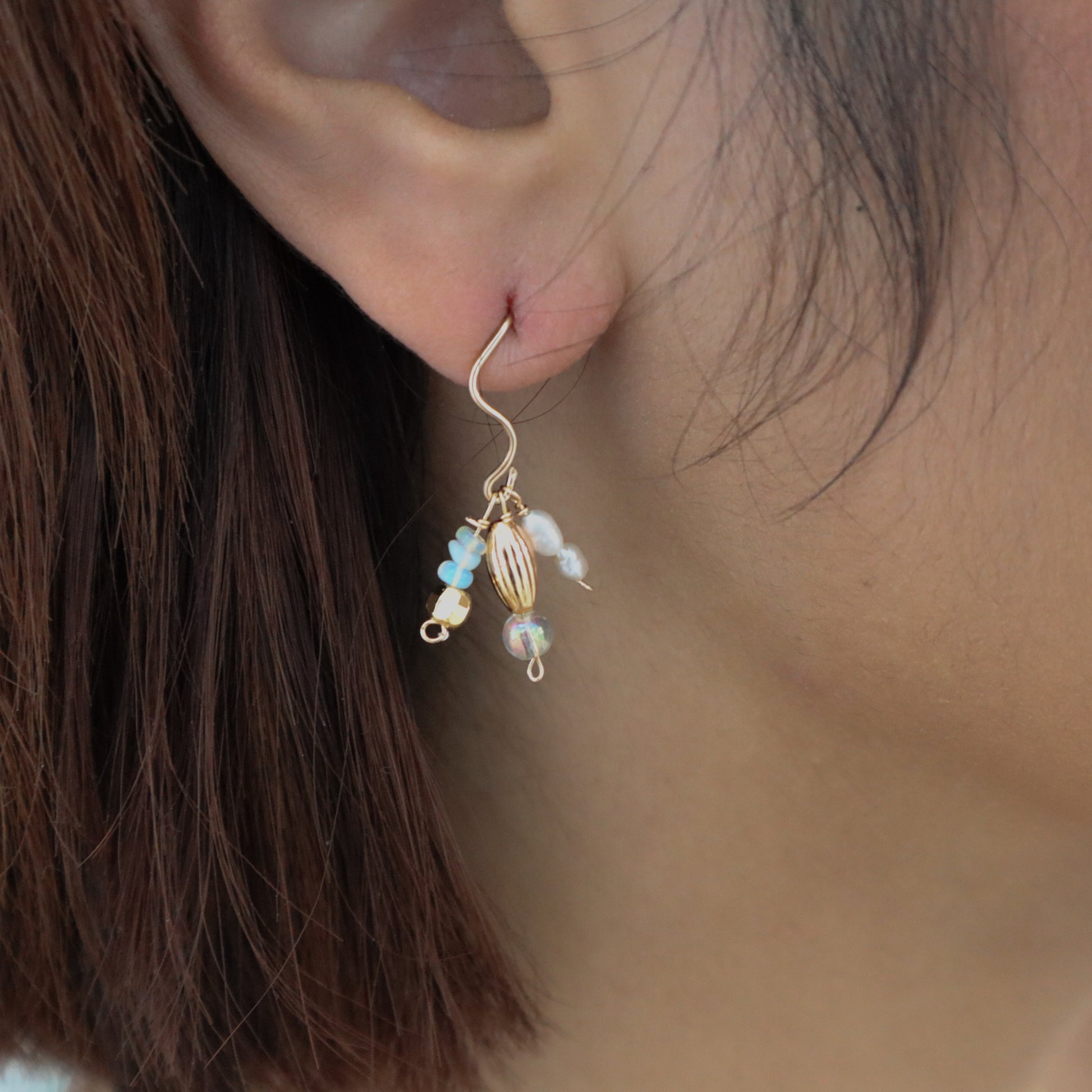 Roop Jewelry twinkle earrings in soirée pearl. Handmade jewelry in Oakland, Ca.