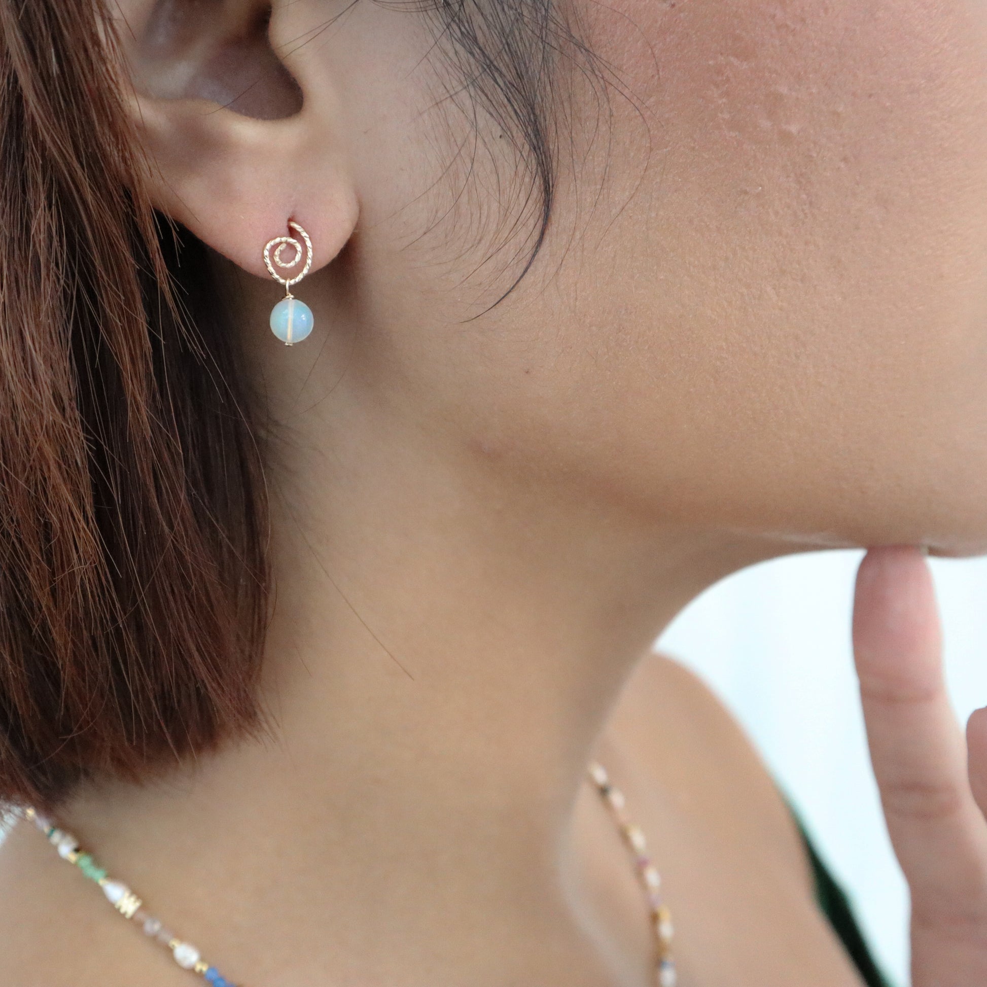 Roop Jewelry twinkle earrings in sparkly swirly opal. Handmade jewelry in Oakland, Ca.