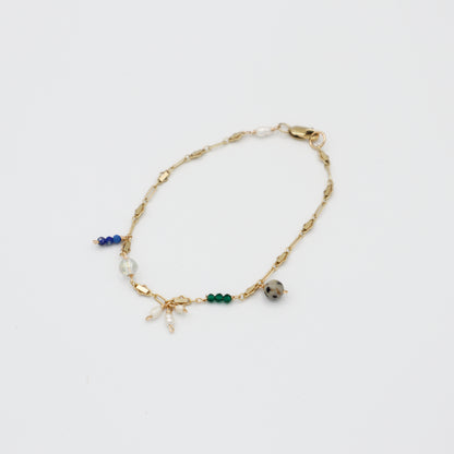 Roop Jewelry Sprinkle Bracelet. Lapis lazuli, emerald, dalmation stone, and pearl jewelry handmade in Oakland, Ca.