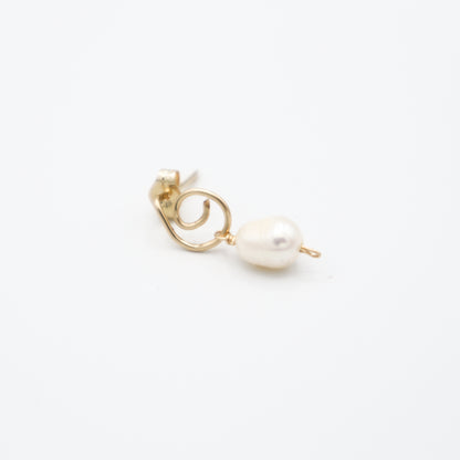 Roop Jewelry twinkle earrings in swirly pearl. Handmade jewelry in Oakland, Ca.