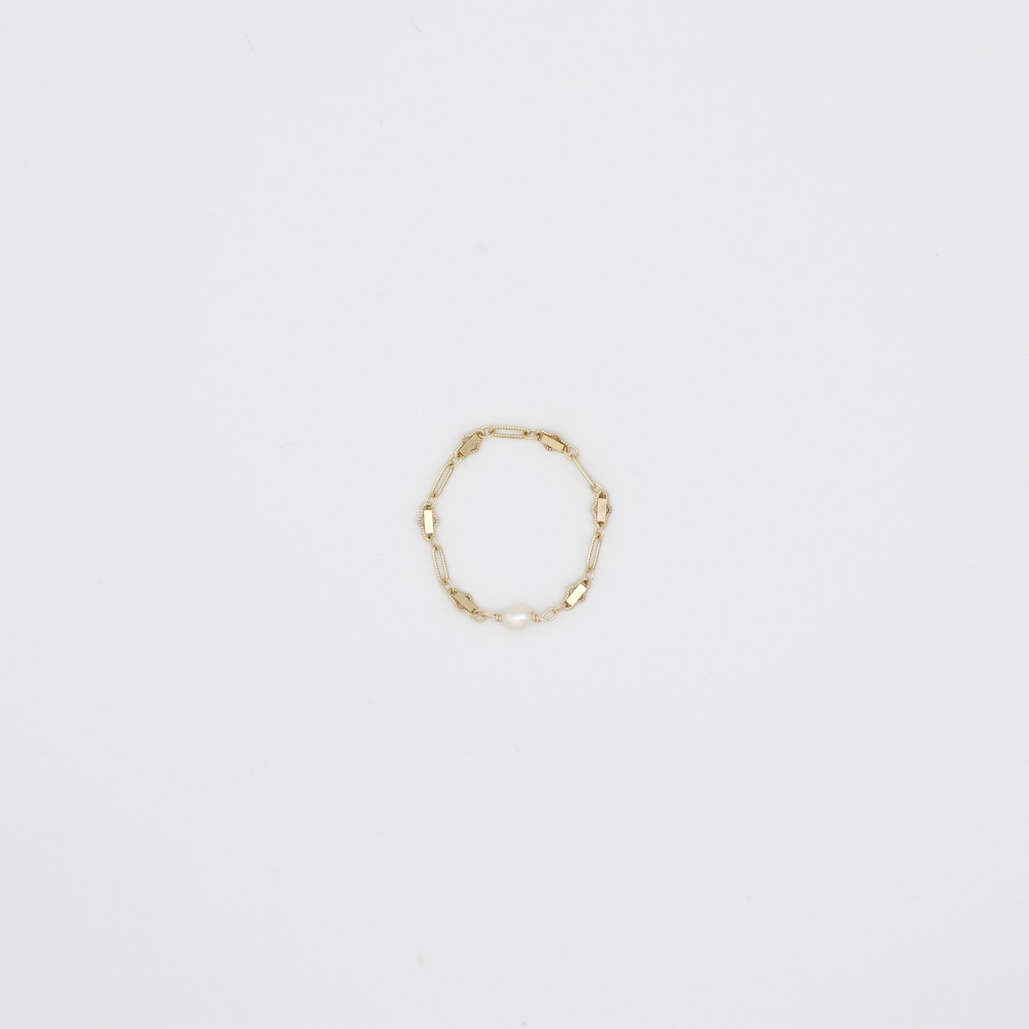 Roop Jewelry tiny pearl chain ring. Handmade 14k gold filled jewelry in Oakland, Ca.