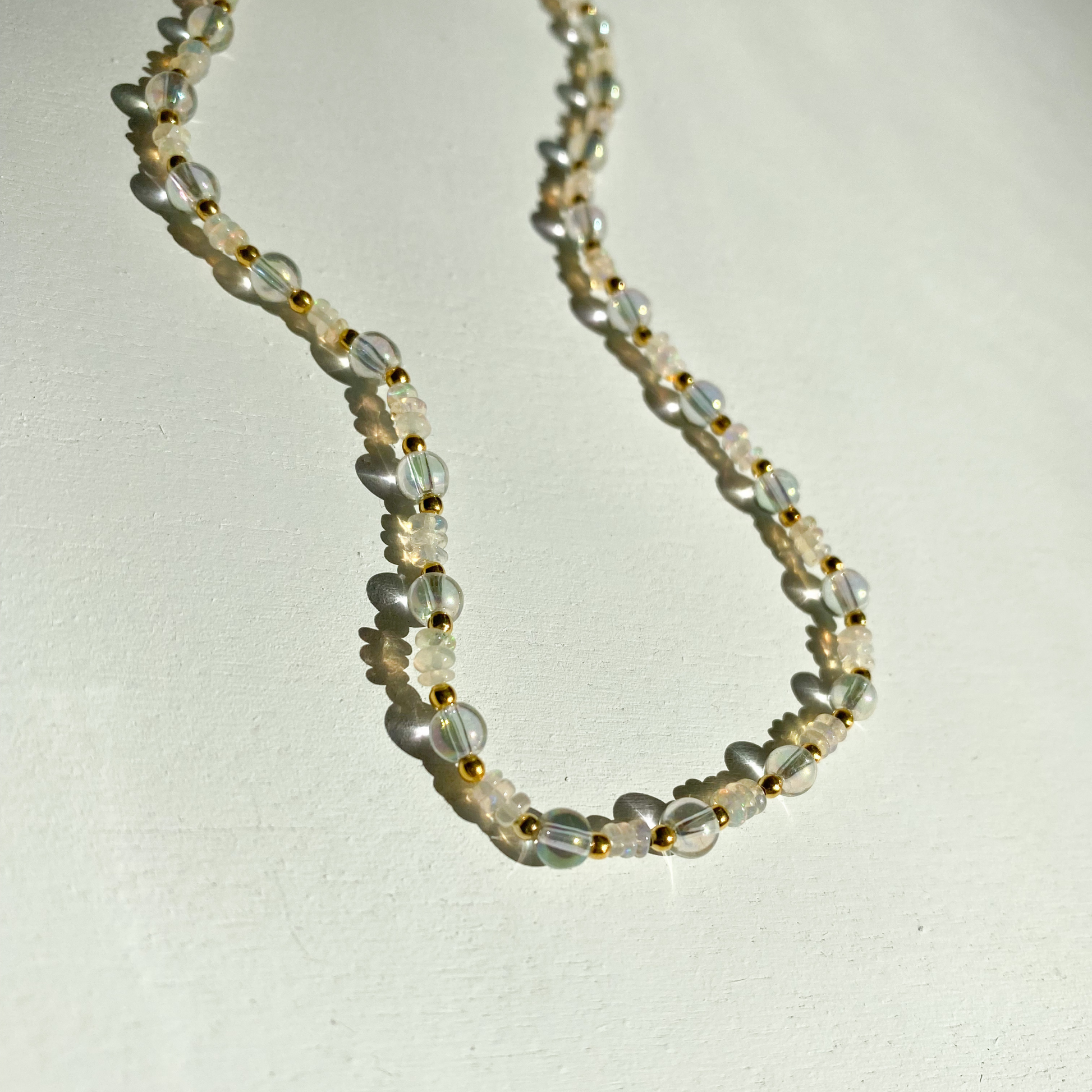 Roop jewelry opal glass necklace. Ethiopian opal and gold filled necklace. Unique jewelry in Oakland, Ca.
